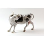 A Bing & Grondahl model of a cow licking, no. 2161 by Laurits Jensen, factory marks beneath front