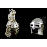 † Edward II (1970) A pair of ornate medieval style Soldier Helmets with fixed Eye Guard Visors.