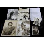 † Charlton Heston - An official period circa 1950's, studio publicity photograph hand signed by