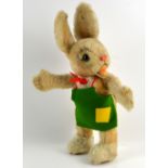 Steiff rabbit in a green apron,.