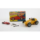Schuco Grand Prix Racer 1070 original box with key, spanner and instructions together with a Dinky