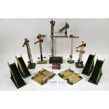 A quantity of tin plate railway signals and crossings including Hornby. (qty)Provenance: Single