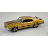 Three Franklin Mint 1:24 scale diecast precision models including 1948 Tucker and 1970 Oldsmobile,