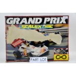 Three Scalextric sets; Monster Trucks C1024, Grand Prix C1025 and Grand Prix C573, all boxed,