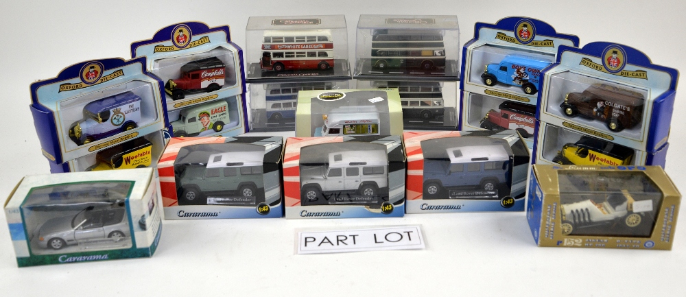 A quantity of boxed diecast models, mostly classic cars, buses and vans, including Ertl, Onyx,