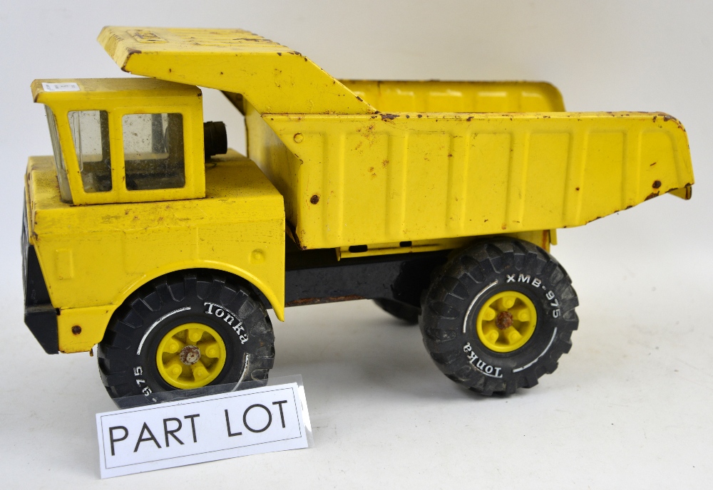 Three Tonka large scale pressed metal construction vehicles including 'Mighty Shovel' and 'Turbo