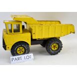 Three Tonka large scale pressed metal construction vehicles including 'Mighty Shovel' and 'Turbo