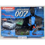 Two boxed Carrera Go James Bond 007 sets; Die Another Day and Casino Royale, completeness unchecked.