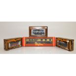 Boxed Hornby 00 gauge coaches and wagons together with boxed Mainline Wagons,.