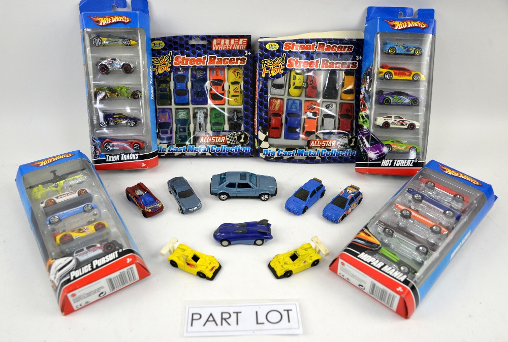 A quantity of boxed and unboxed models, mainly Hotwheels. (qty)Provenance: Single owner stock