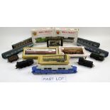 A quantity of rolling stock, carriages and wagons including Hornby and Bachmann, various gauges. (