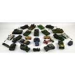 A quantity of Corgi and Dinky diecast tanks and military vehicles. (qty)Provenance: Single owner