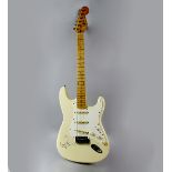 Paul McCartney - A Squier Stratocaster electric guitar, serial number VN353458 signed on the body in