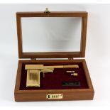 James Bond The Man With The Golden Gun - A replica golden gun, 24 karat gold-plated replica