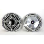 Two American wheel hubcaps Buick and Chrysler both 15 inch in diameter. They were bought by a fan in