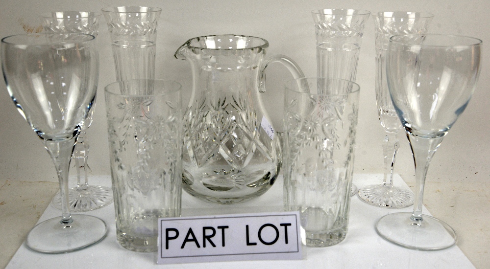 Four William Yeoward glasses, eight Stuart champagne glasses, four wine glasses and a cut glass