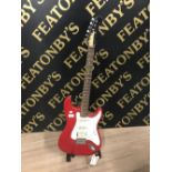 ELECTRIC GUITAR IN RED