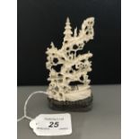 LATE 19TH/EARLY 20TH CENTURY CARVED IVORY STUDY OF A CHINESE BOAT below a tree with figures walking