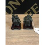 2 SMALL CHINESE BRONZE FIGURES OF A BUDDHA both with wood stands (6cm high approx)