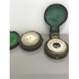 2 CASED POCKET BAROMETERS