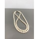 FINE QUALITY DOUBLE STRAP OF PEARLS WITH GOLD CLASP