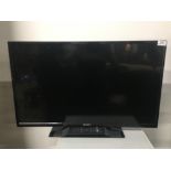 BUSH 32 INCH TV WITH REMOTE