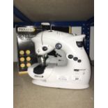 7 STICH SEWING MACHINE IN BOX