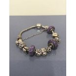 14CT PANDORA BRACELET WITH ASSORTED CHARMS