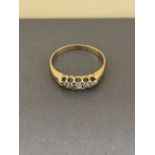 18CT 5 STONE RING (2.