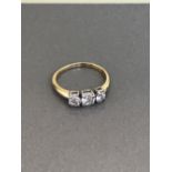 18CT YELLOW 3 STONE DIAMOND RING