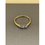 18CT 3 STONE DIAMOND RING APPROX .