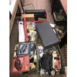 4 BOXES OF MISCELLANEOUS INCLUDES AUTO MANUALS HAND TOOLS CHINA AND GLASS AND BOXED GOLF TRAINER