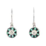 A pair of diamond, emerald and gem-set earrings. Each designed as a brilliant-cut diamond collet,