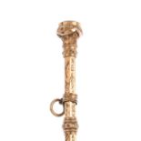 An early 20th century 9ct gold retractable pencil. With engraved scrolling foliate motif and