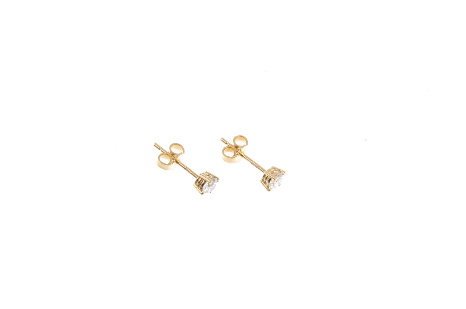 A pair of 18ct gold brilliant-cut diamond stud earrings. With mini report 20034449, from AnchorCert, - Image 2 of 2