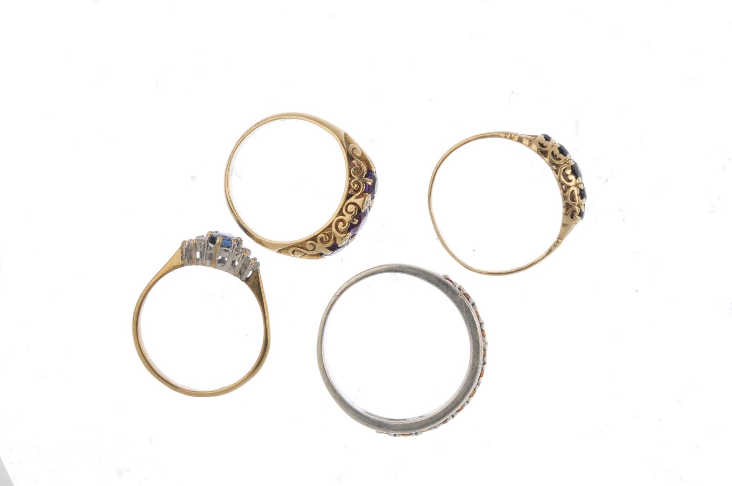 Four 9ct gold gem-set rings. To include a sapphire five-stone ring, an amethyst and diamond dress - Image 2 of 2