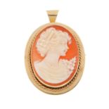 A 9ct gold cameo pendant. The oval cameo, carved to depict a lady in profile, with tapered surmount.