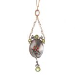 A gem-set pendant. The circular-shape ruby and emerald and rose-cut diamond floral cluster, atop the
