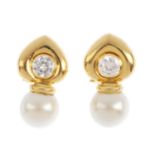 A pair of imitation pearl and cubic zirconia earrings. Each designed as an imitation pearl, with