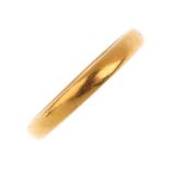 A 22ct gold wedding band ring. Hallmarks for Birmingham, 1940. Ring size K1/2. Weight 2.9gms.