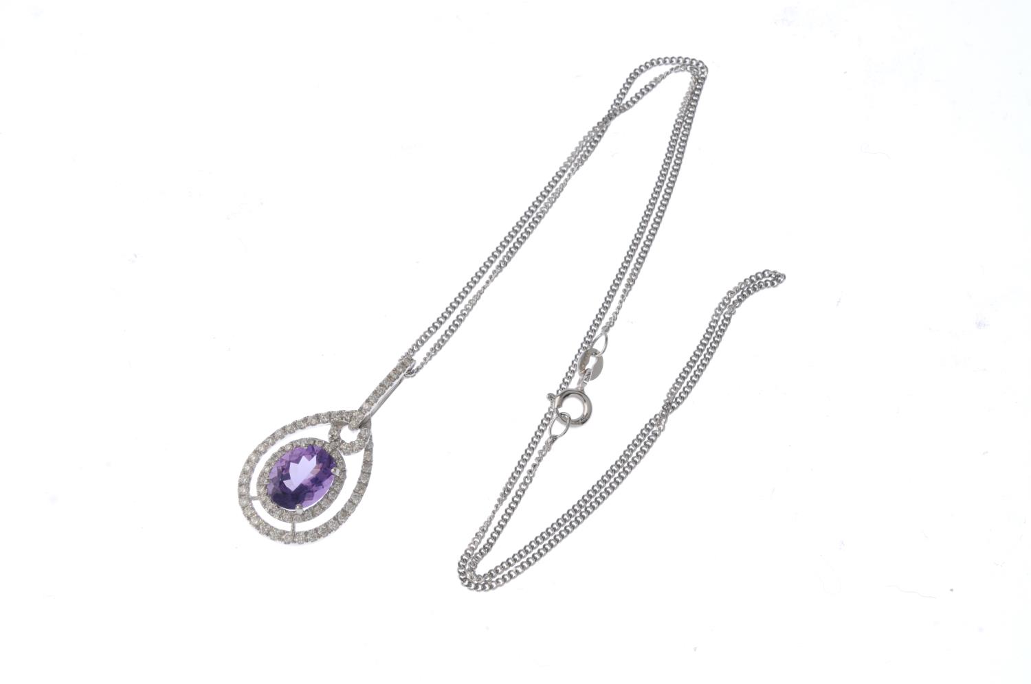 An 18ct gold amethyst and diamond pendant. The oval-shape amethyst and brilliant-cut diamond - Image 3 of 3