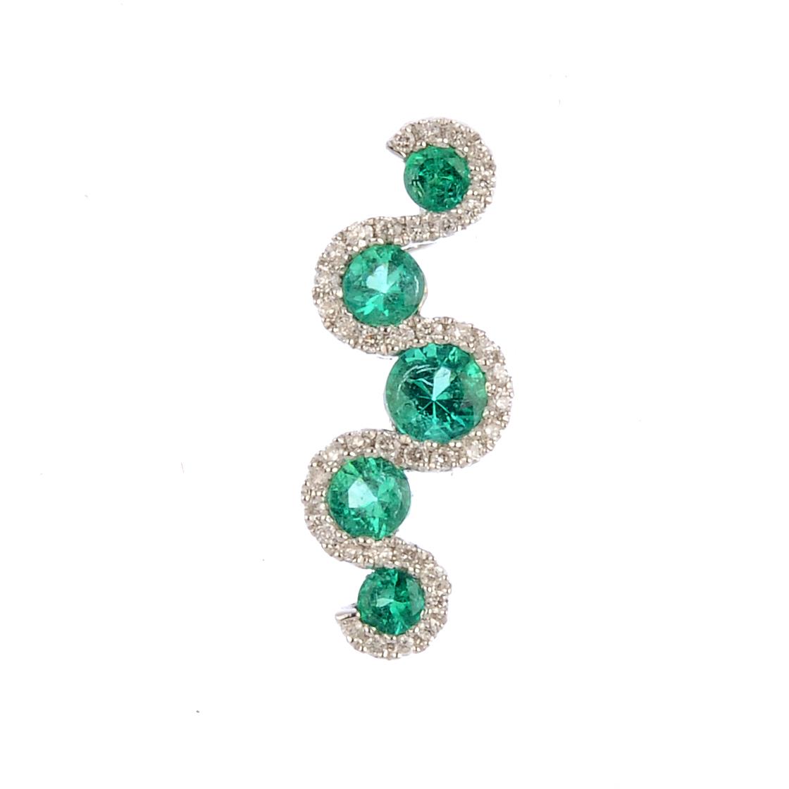 An emerald and diamond pendant. The graduated circular-shape emerald line, with single-cut diamond