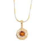 A set of amber jewellery. To include a circular reconstituted amber cabochon pendant, with