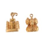 Two charms. To include a Taj Mahal charm, together with an Asura charm. Lengths 1.4 and 2cms. Weight