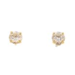 A pair of brilliant-cut diamond stud earrings.