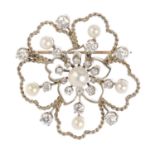 A diamond and cultured pearl brooch. Of floral design, the cultured pearl and vari-cut diamond