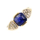 An 18ct gold sapphire and diamond dress ring. The cushion-shape sapphire, with single-cut diamond