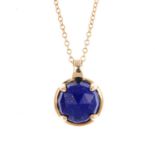 FIORELLI - A pair of lapis lazuli earrings and a pendant. The circular-shape lapis lasuli pendant,