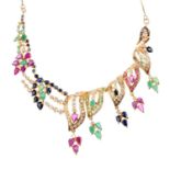 A set of gem-set jewellery. To include a gem-set necklace designed as a series of graduated and