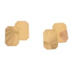 A pair of 9ct gold cufflinks. Each designed as two rectangular-shape textured and polished panels